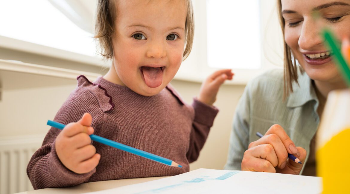 Girl-with-Down-Syndrome-and-Mom-Drawing